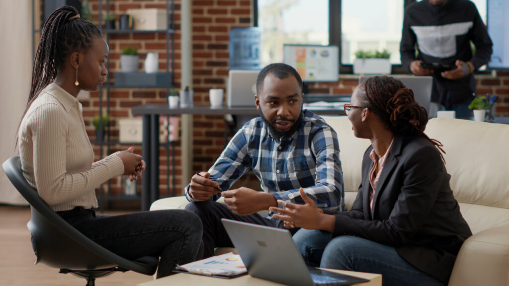 team of business people collaborating to plan financial strategy